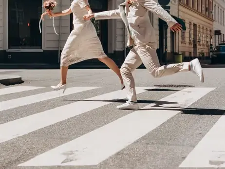 Attorney examining fatal pedestrian accident case documents with Mesa Arts Center traffic corridor map