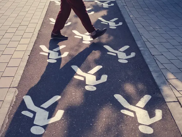 Chandler AZ wrongful death attorney reviewing DUI pedestrian crash evidence near Arizona Avenue crosswalk