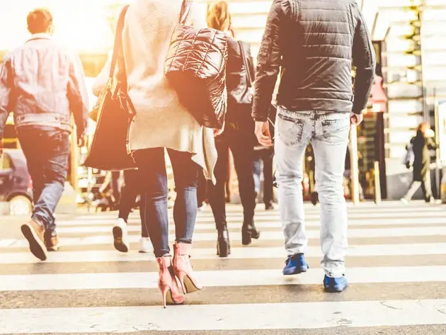 Legal team analyzing traffic camera footage from busy Mesa intersection